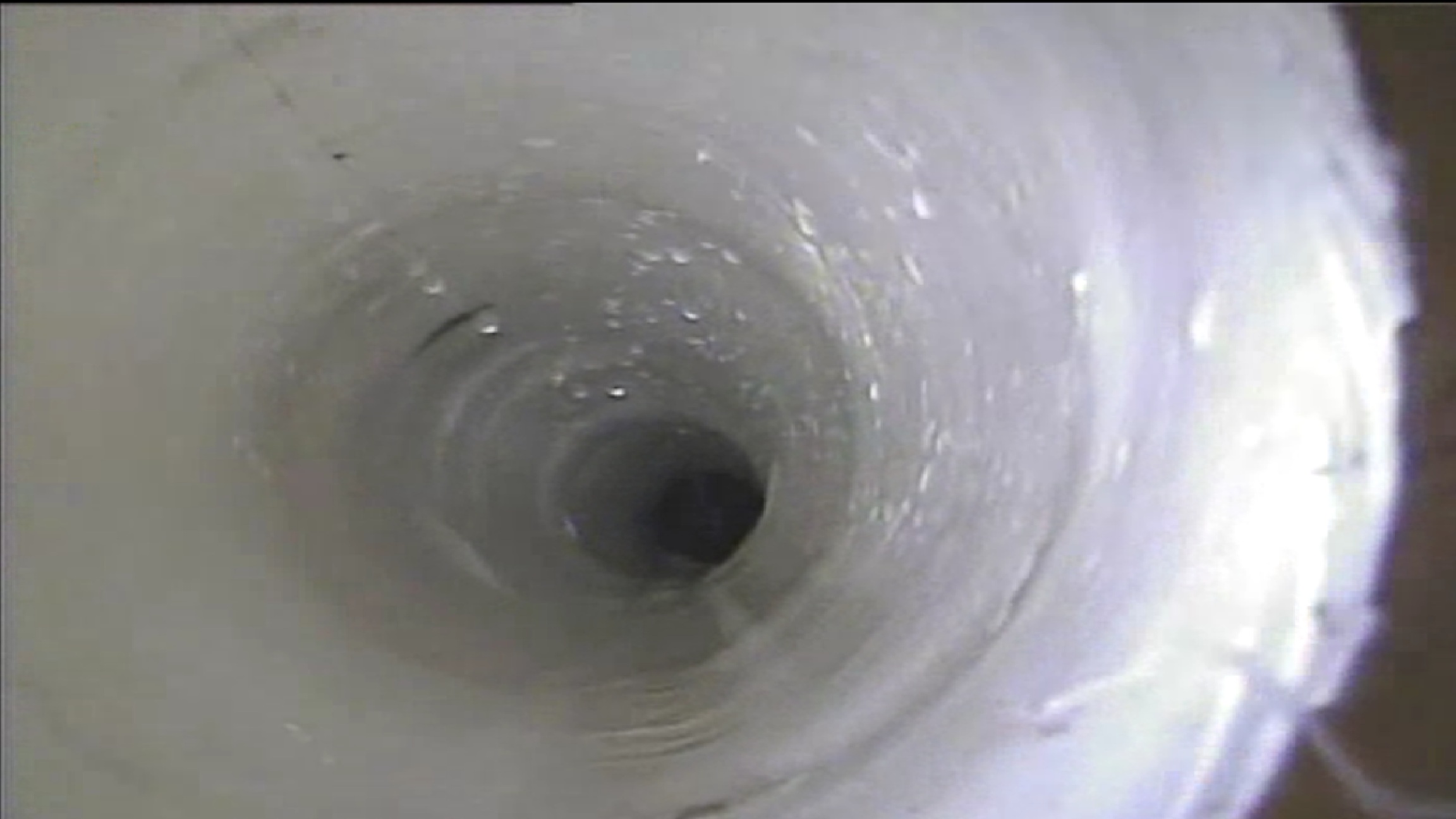 Completed no-dig drain lining installation inside pipe